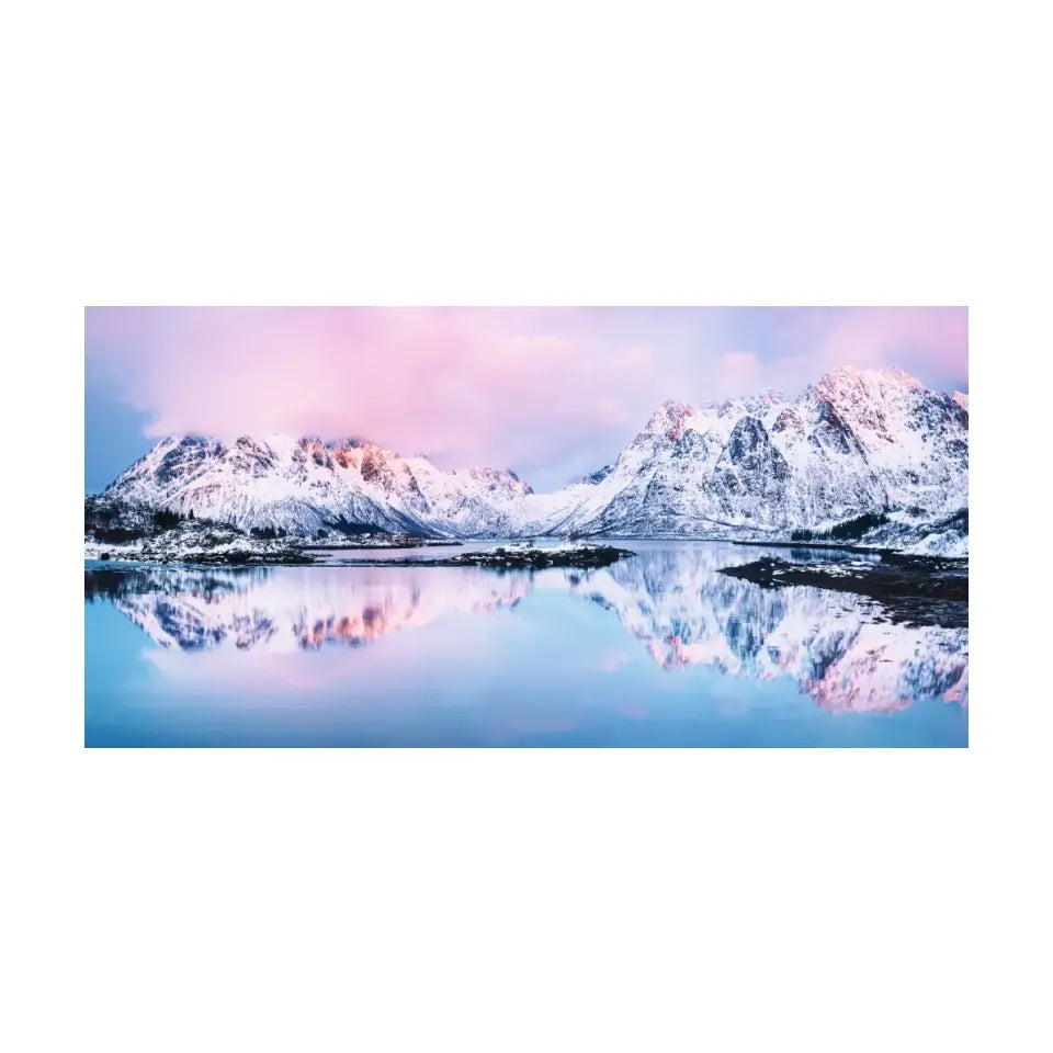 Landscape with beautiful winter lake and snowy mountains at sunset