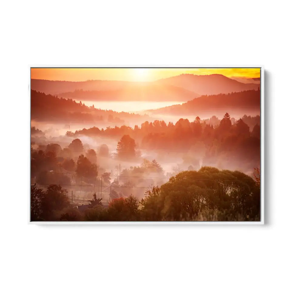 Foggy morning landscape with mountain range and misty forest