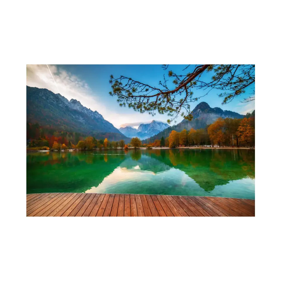 Jasna lake with beautiful mountains and wooden pier