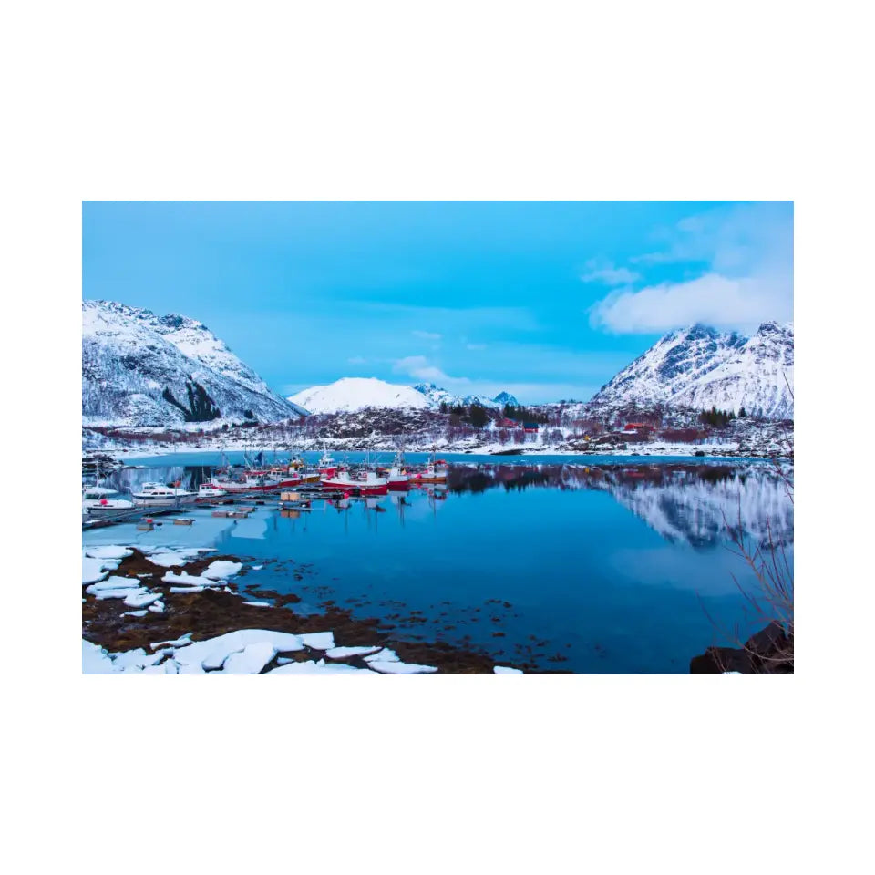 Landscape with beautiful winter lake and snowy mountains