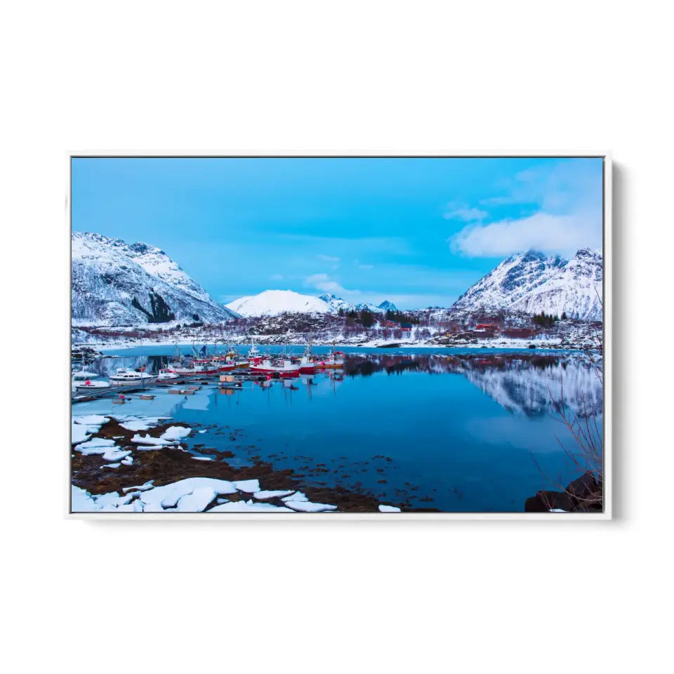 Landscape with beautiful winter lake and snowy mountains