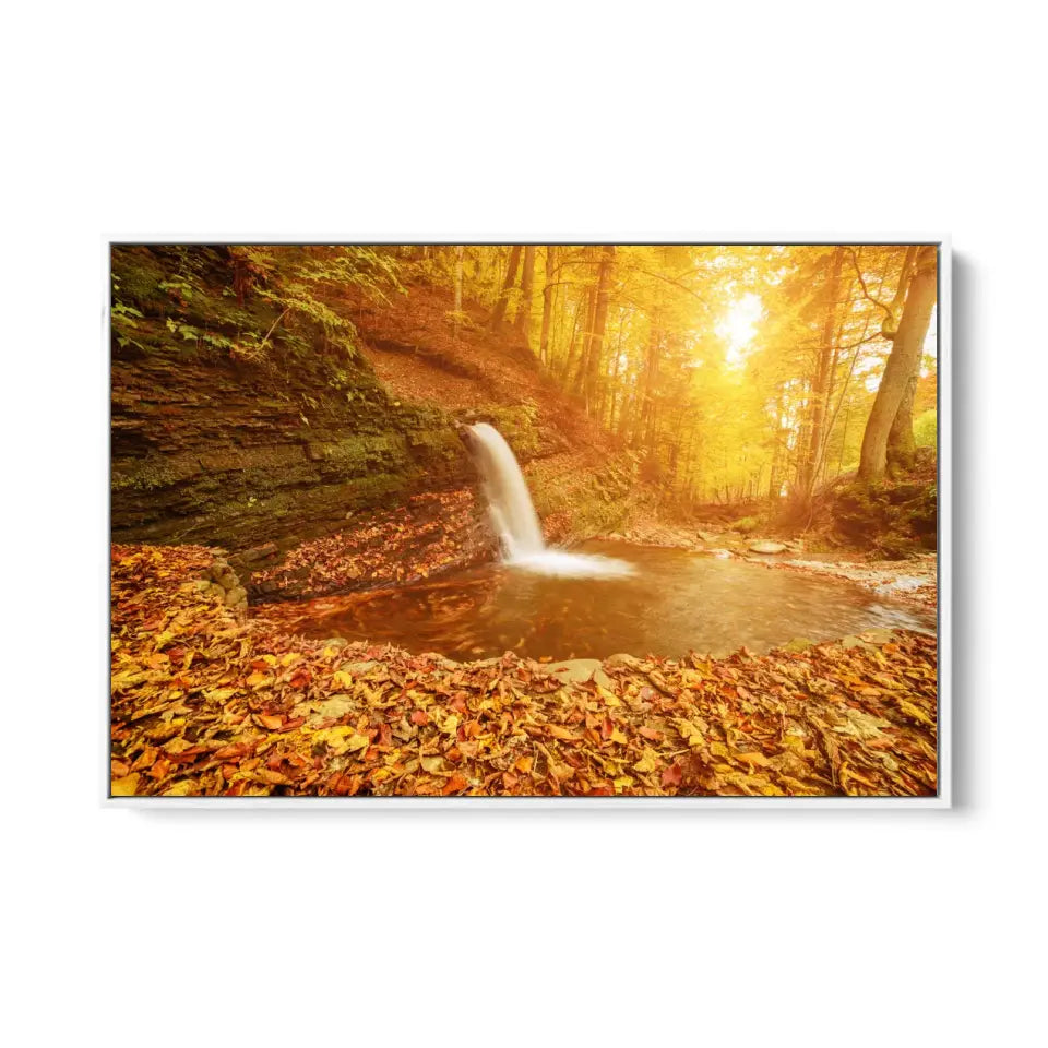 Mountain waterfall with colorful red fallen dry leaves