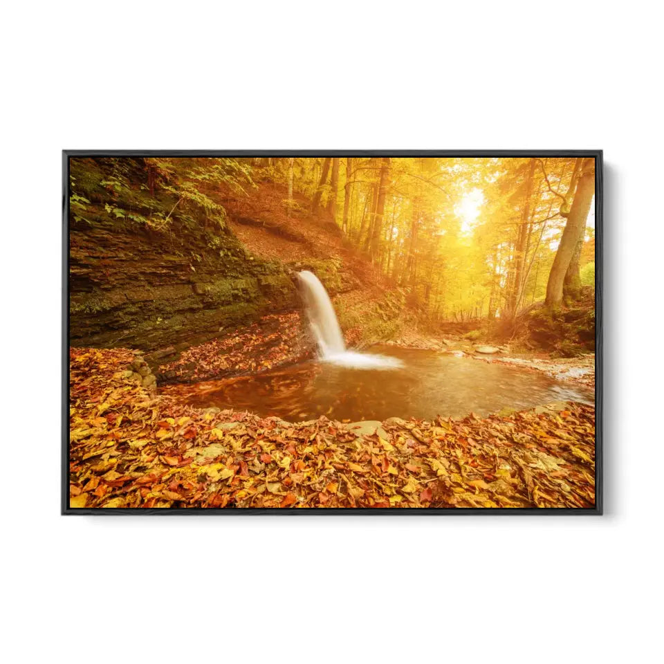 Mountain waterfall with colorful red fallen dry leaves