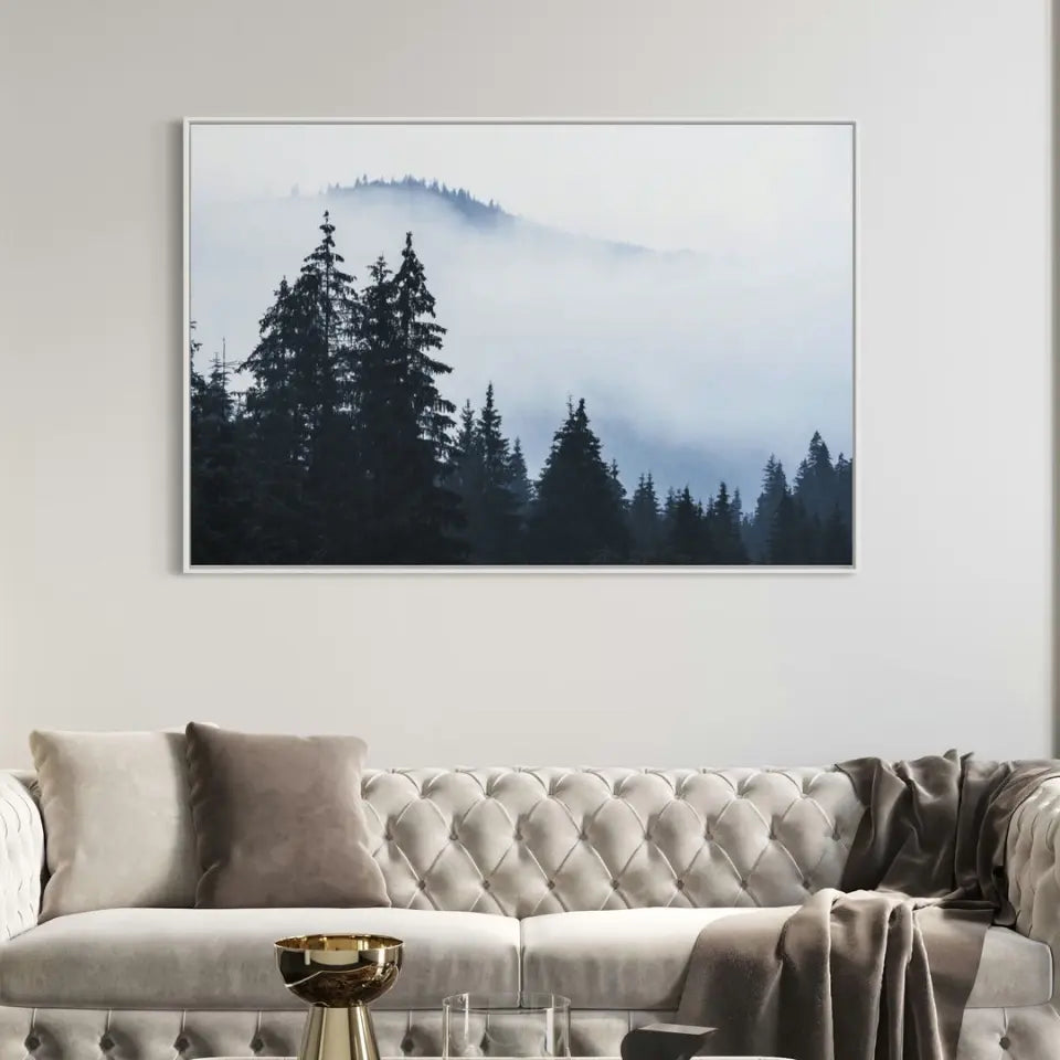 Foggy landscape with mountains and fir forest