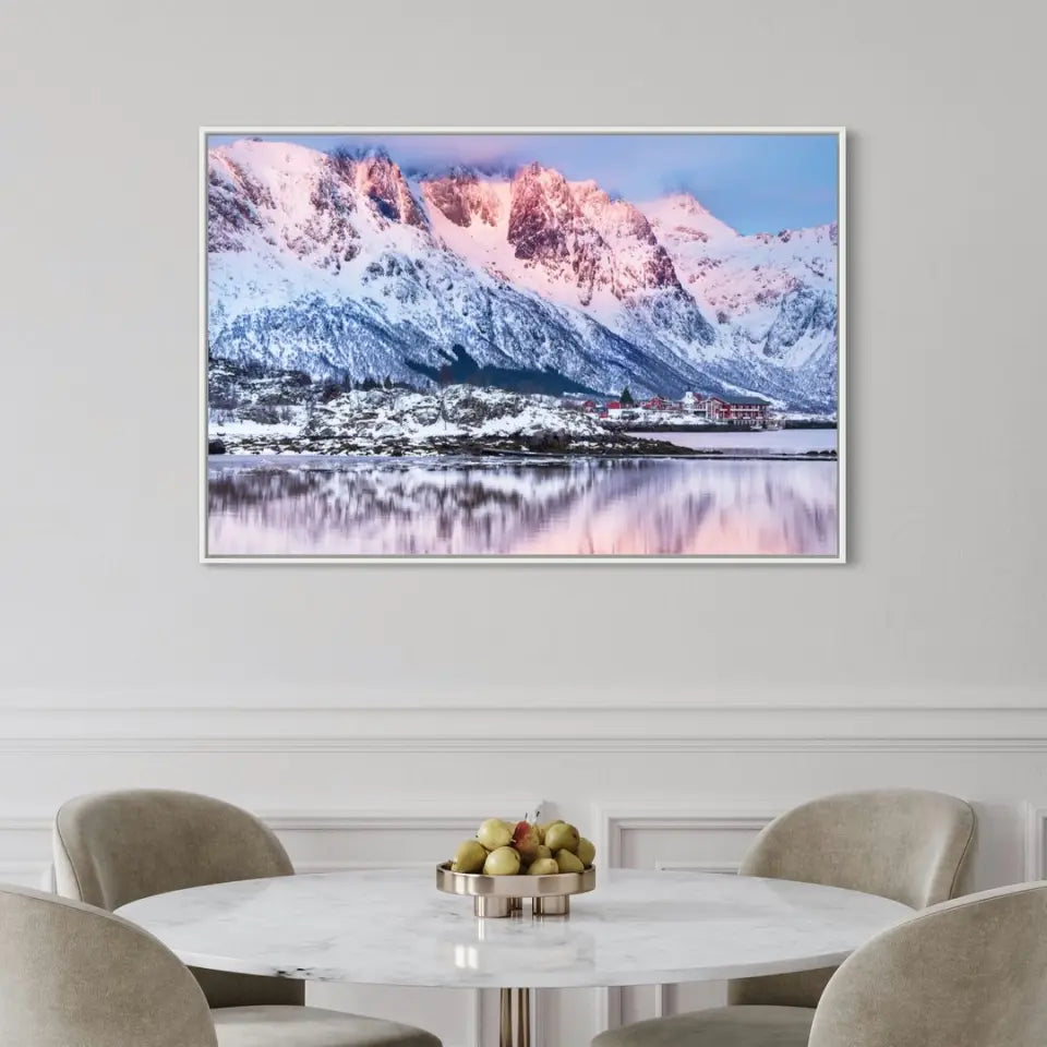 Beautiful winter lake and snowy mountains at sunset